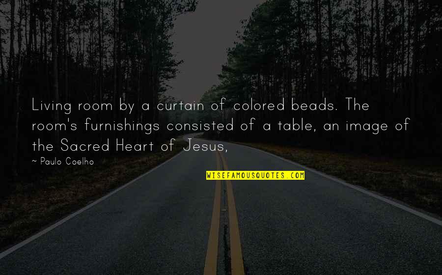 Typeset Letters Quotes By Paulo Coelho: Living room by a curtain of colored beads.