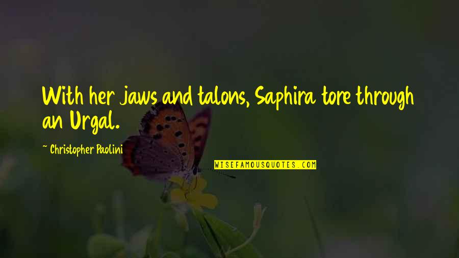 Urgal Quotes By Christopher Paolini: With her jaws and talons, Saphira tore through Urgal Quotes By Christopher Paolini: With her jaws and talons, Saphira tore through