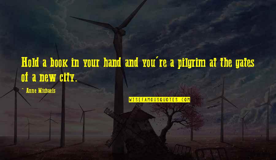 Vkn Quotes By Anne Michaels: Hold a book in your hand and you're