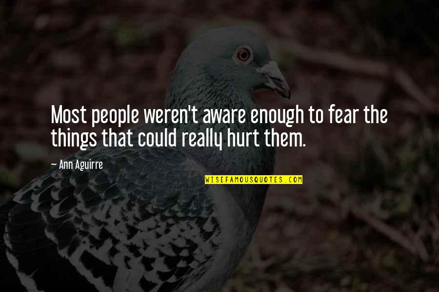 Weren T Quotes By Ann Aguirre: Most people weren't aware enough to fear the