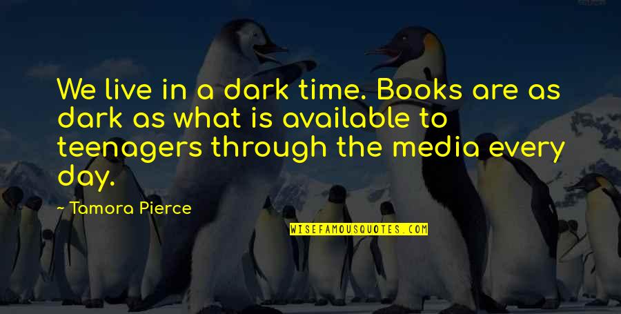 What's In The Dark Quotes By Tamora Pierce: We live in a dark time. Books are