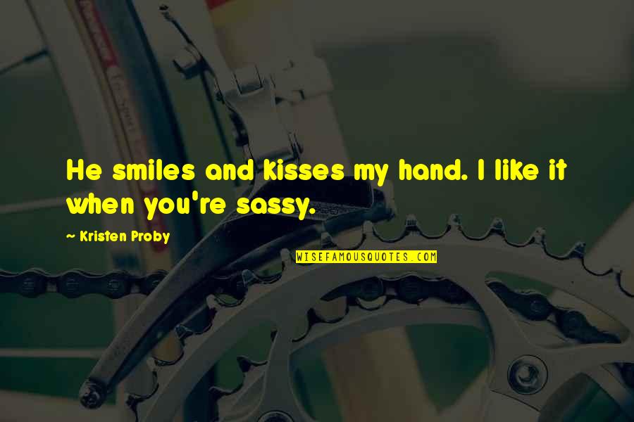 When He Smiles Quotes By Kristen Proby: He smiles and kisses my hand. I like