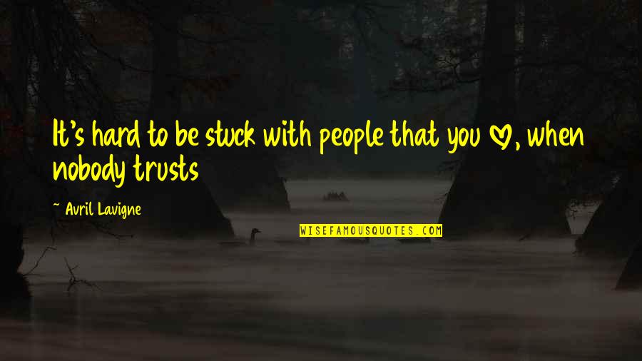 When You're Stuck Quotes By Avril Lavigne: It's hard to be stuck with people that