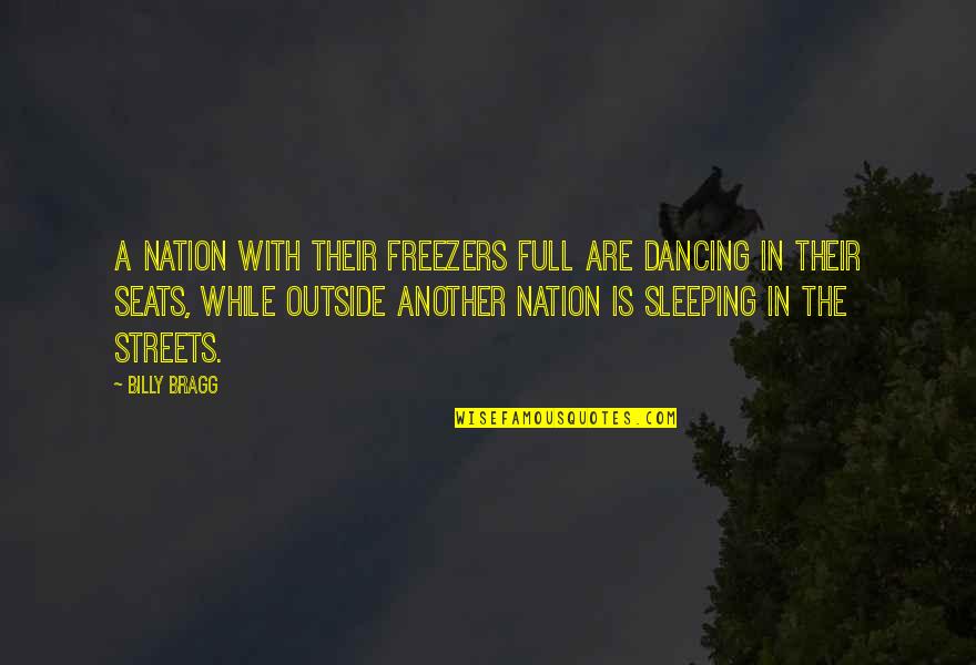 While You Are Sleeping Quotes By Billy Bragg: A nation with their freezers full are dancing