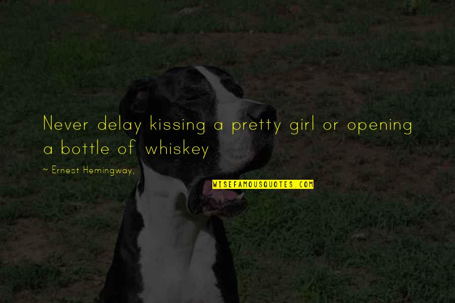 Whiskey Bottle Quotes By Ernest Hemingway,: Never delay kissing a pretty girl or opening