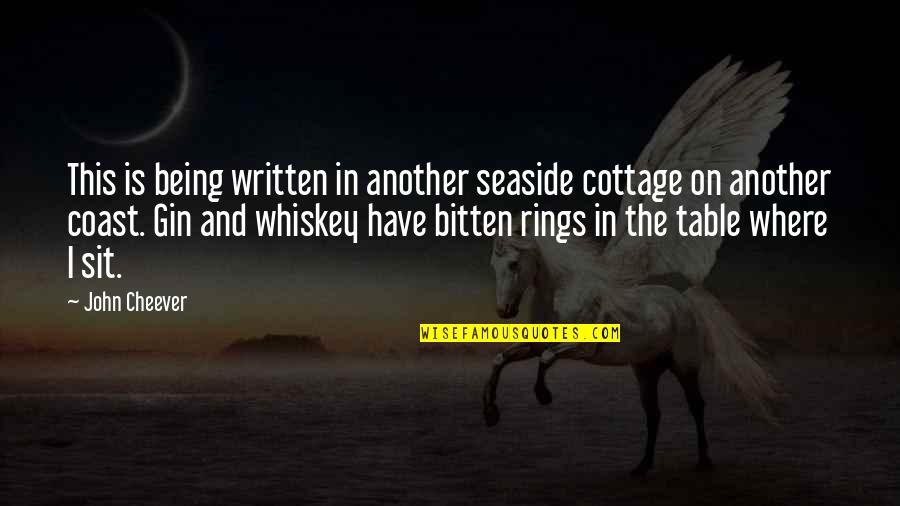 Whiskey In Quotes By John Cheever: This is being written in another seaside cottage Whiskey In Quotes By John Cheever: This is being written in another seaside cottage