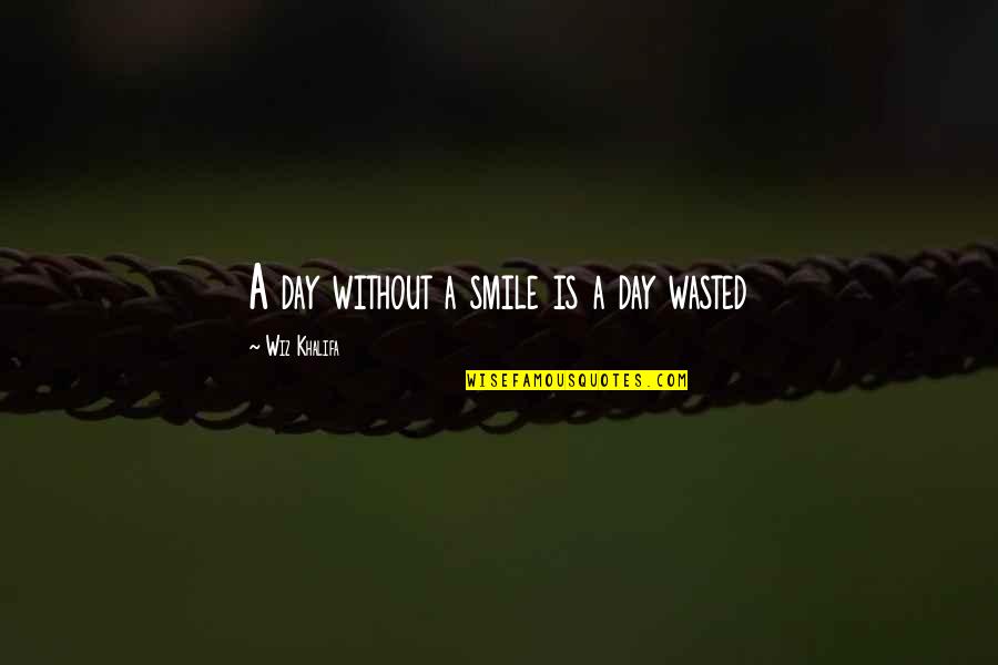 Wiz Quotes By Wiz Khalifa: A day without a smile is a day