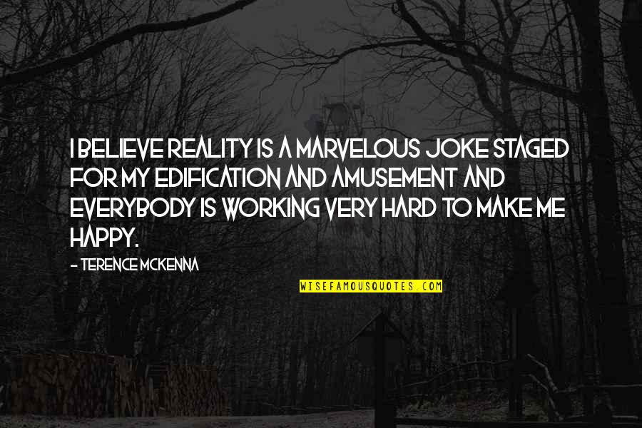 Working Very Hard Quotes By Terence McKenna: I believe reality is a marvelous joke staged