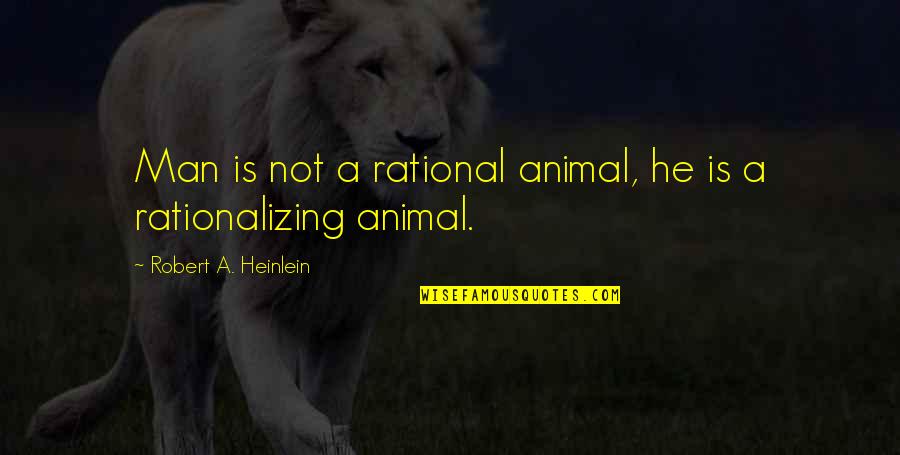 Writersblock Quotes By Robert A. Heinlein: Man is not a rational animal, he is