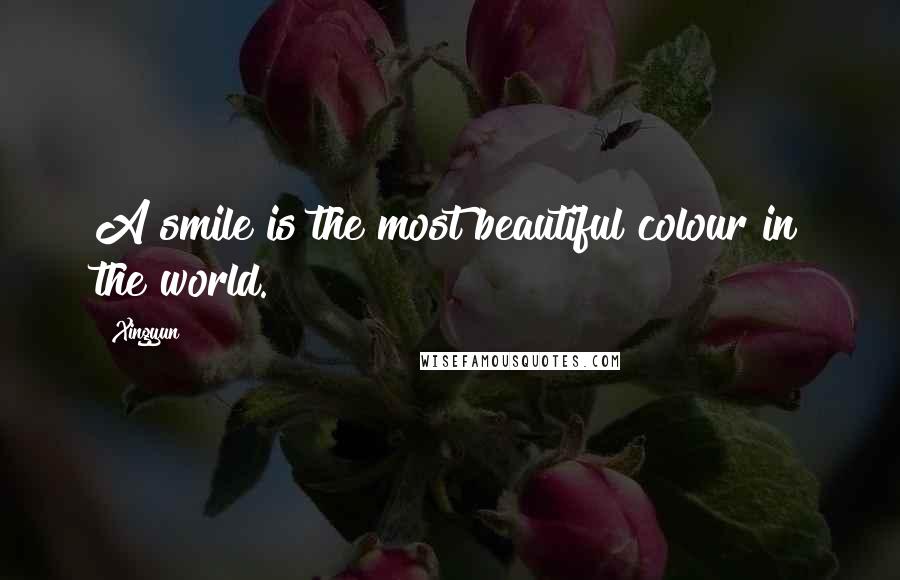 Xingyun quotes: A smile is the most beautiful colour in the world.