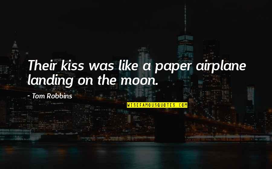 You Are Like Moon Quotes By Tom Robbins: Their kiss was like a paper airplane landing