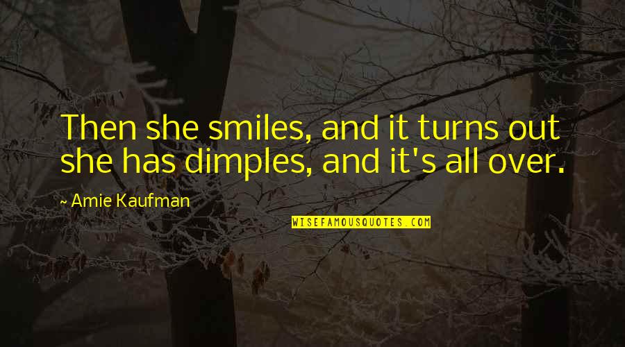Your Dimples Quotes By Amie Kaufman: Then she smiles, and it turns out she