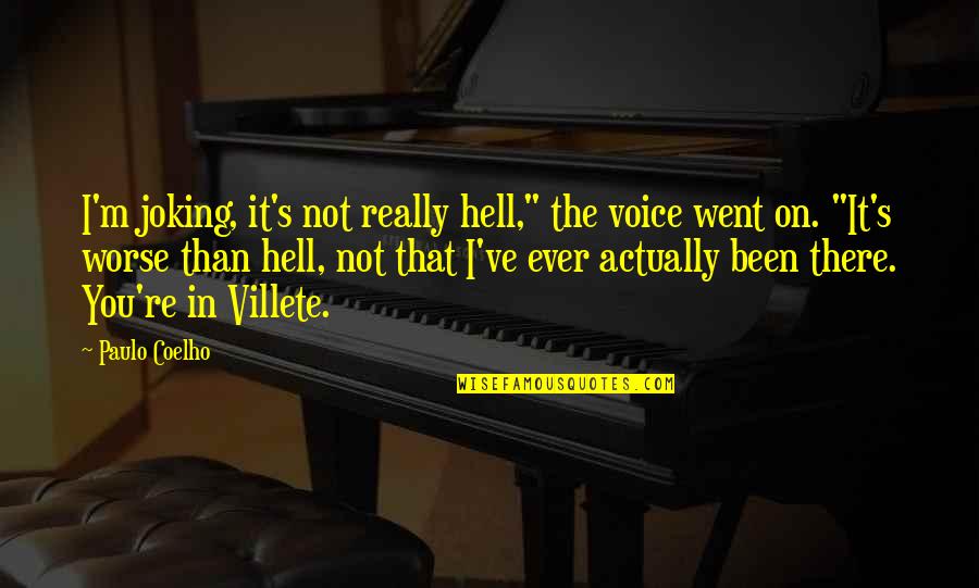 You're Not There Quotes By Paulo Coelho: I'm joking, it's not really hell," the voice