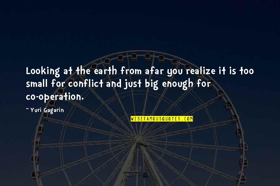 Yuri Gagarin Quotes By Yuri Gagarin: Looking at the earth from afar you realize Yuri Gagarin Quotes By Yuri Gagarin: Looking at the earth from afar you realize