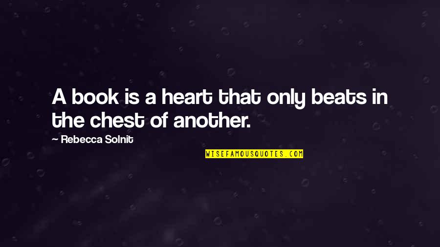 Zarick Dc Quotes By Rebecca Solnit: A book is a heart that only beats Zarick Dc Quotes By Rebecca Solnit: A book is a heart that only beats