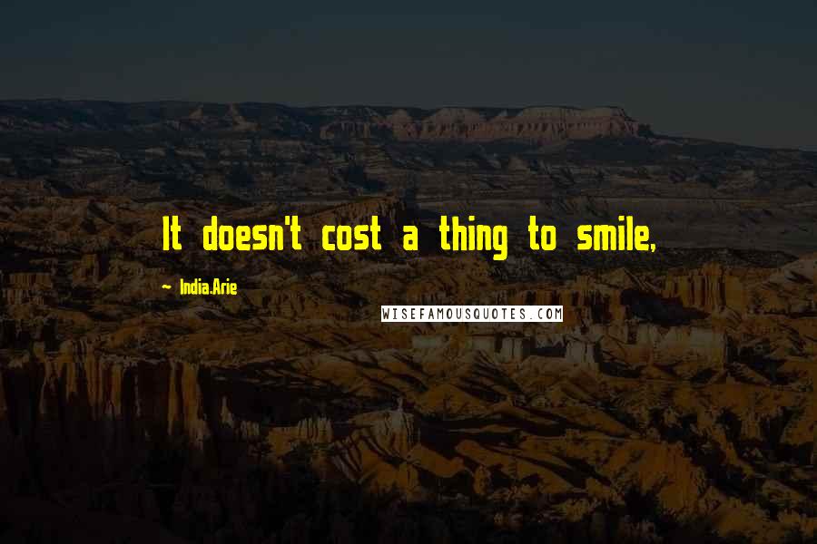 India.Arie Quotes: It doesn't cost a thing to smile,