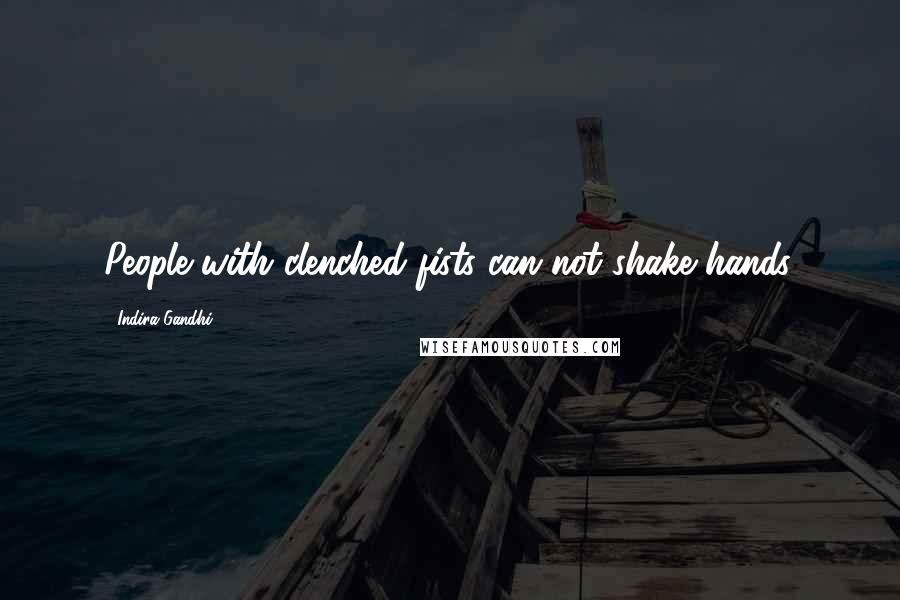 Indira Gandhi Quotes: People with clenched fists can not shake hands.