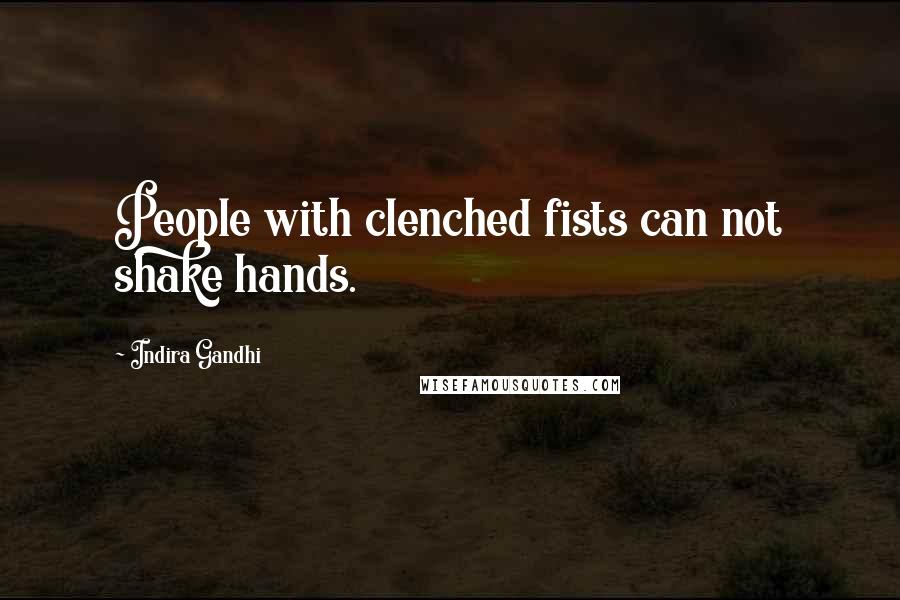 Indira Gandhi Quotes: People with clenched fists can not shake hands.