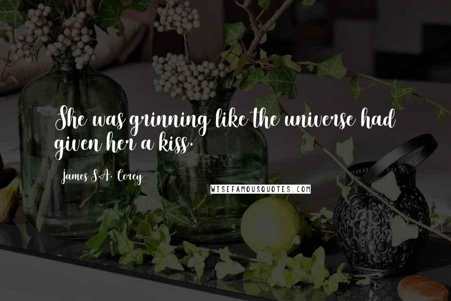 James S.A. Corey Quotes: She was grinning like the universe had given her a kiss.