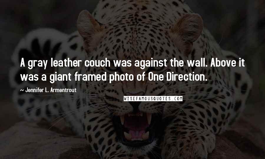 Jennifer L. Armentrout Quotes: A gray leather couch was against the wall. Above it was a giant framed photo of One Direction.