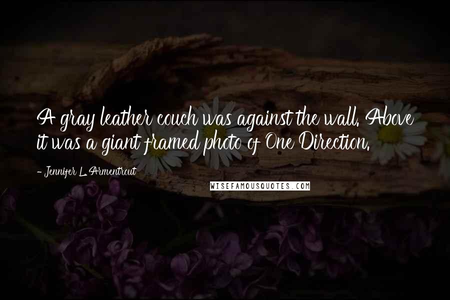 Jennifer L. Armentrout Quotes: A gray leather couch was against the wall. Above it was a giant framed photo of One Direction.