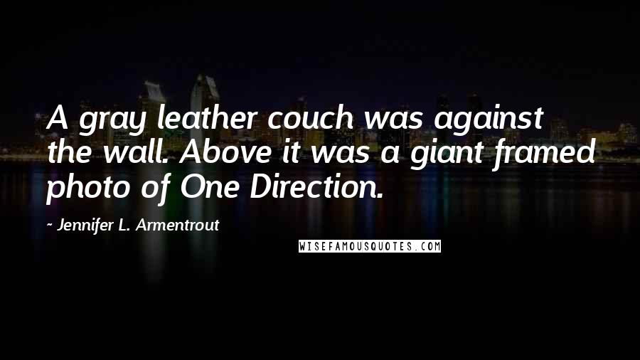 Jennifer L. Armentrout Quotes: A gray leather couch was against the wall. Above it was a giant framed photo of One Direction.