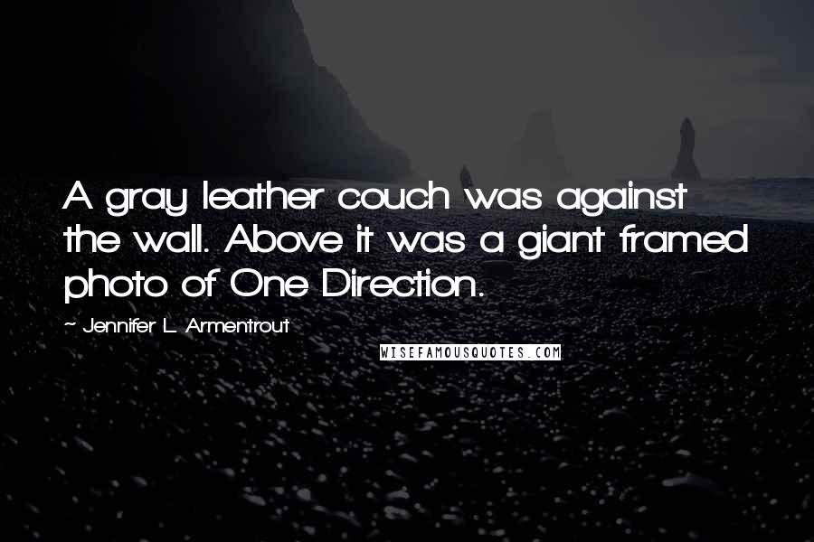 Jennifer L. Armentrout Quotes: A gray leather couch was against the wall. Above it was a giant framed photo of One Direction.