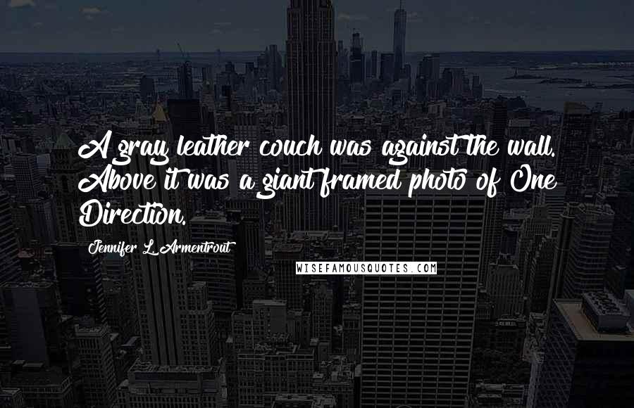 Jennifer L. Armentrout Quotes: A gray leather couch was against the wall. Above it was a giant framed photo of One Direction.
