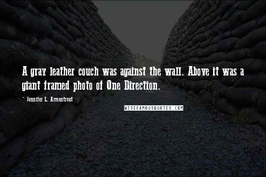 Jennifer L. Armentrout Quotes: A gray leather couch was against the wall. Above it was a giant framed photo of One Direction.