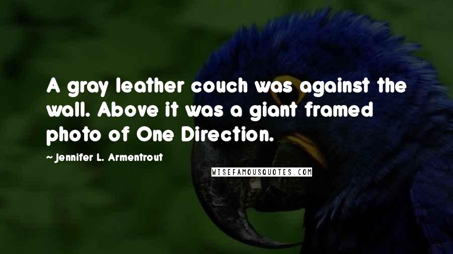 Jennifer L. Armentrout Quotes: A gray leather couch was against the wall. Above it was a giant framed photo of One Direction.