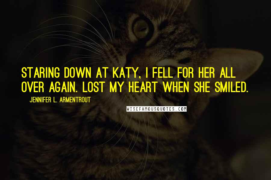 Jennifer L. Armentrout Quotes: Staring down at Katy, I fell for her all over again. Lost my heart when she smiled.