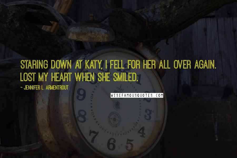 Jennifer L. Armentrout Quotes: Staring down at Katy, I fell for her all over again. Lost my heart when she smiled.