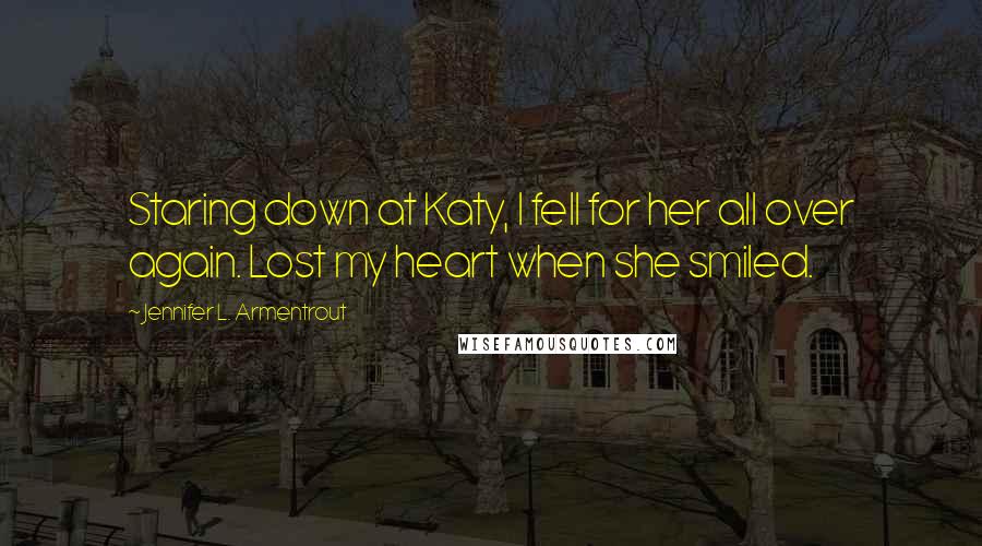 Jennifer L. Armentrout Quotes: Staring down at Katy, I fell for her all over again. Lost my heart when she smiled.