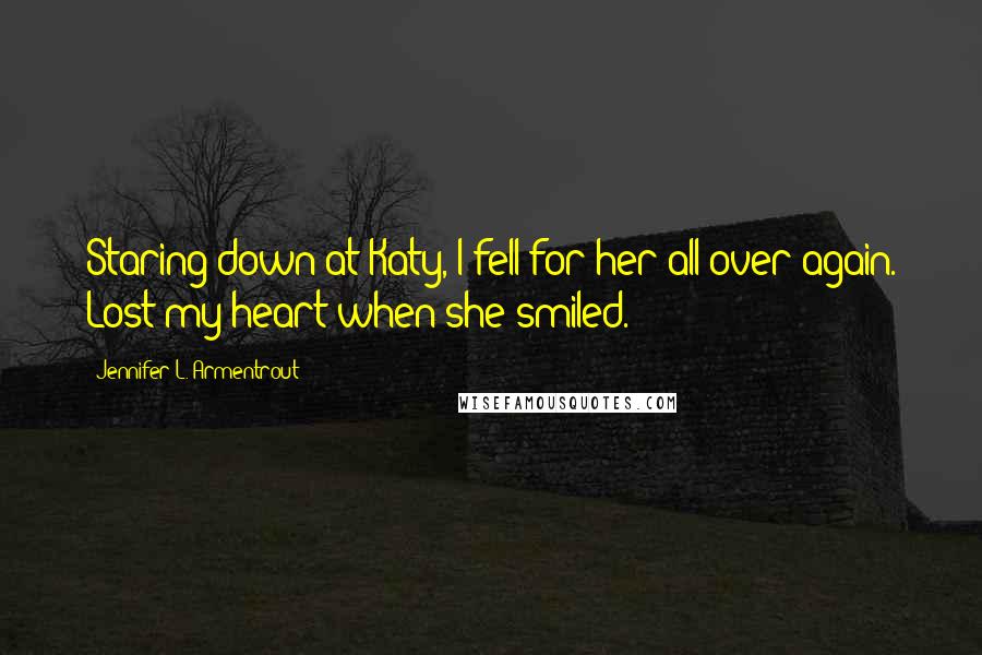 Jennifer L. Armentrout Quotes: Staring down at Katy, I fell for her all over again. Lost my heart when she smiled.