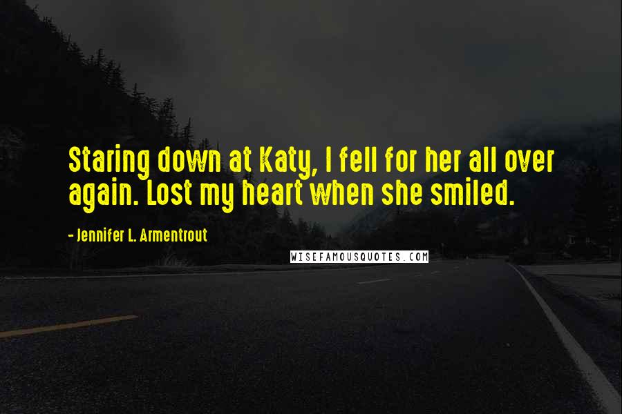 Jennifer L. Armentrout Quotes: Staring down at Katy, I fell for her all over again. Lost my heart when she smiled.