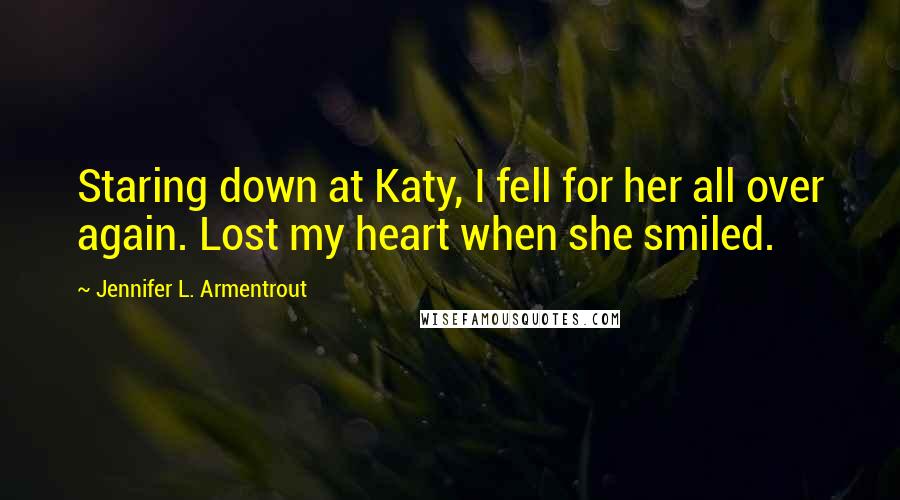 Jennifer L. Armentrout Quotes: Staring down at Katy, I fell for her all over again. Lost my heart when she smiled.