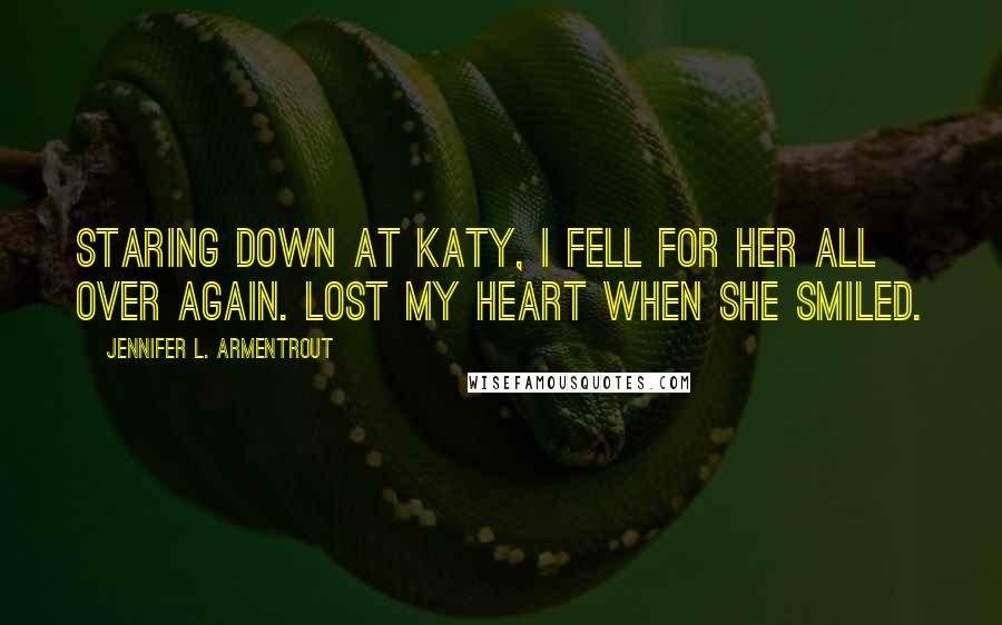 Jennifer L. Armentrout Quotes: Staring down at Katy, I fell for her all over again. Lost my heart when she smiled.