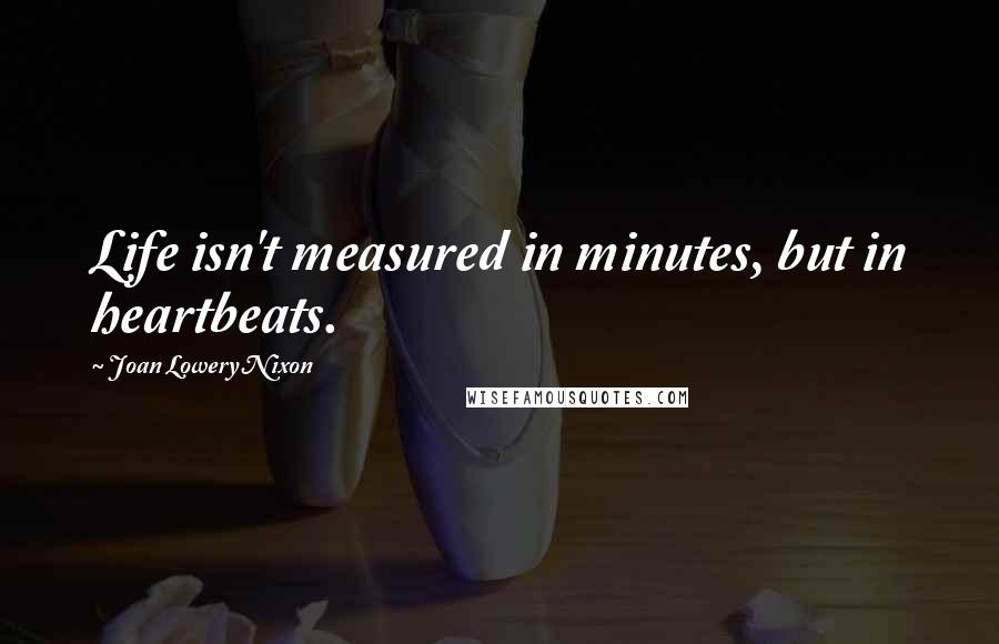 Joan Lowery Nixon Quotes: Life isn't measured in minutes, but in heartbeats.