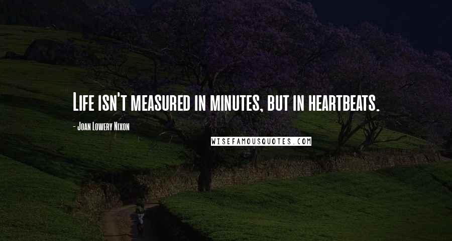 Joan Lowery Nixon Quotes: Life isn't measured in minutes, but in heartbeats.