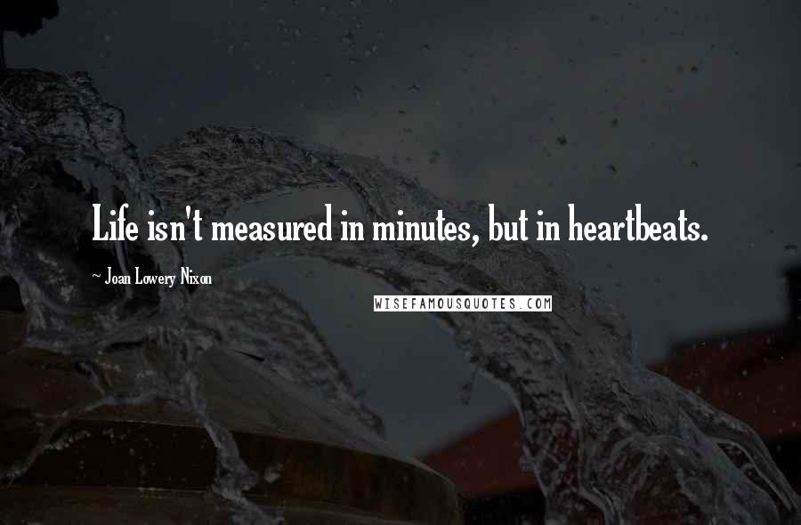 Joan Lowery Nixon Quotes: Life isn't measured in minutes, but in heartbeats.