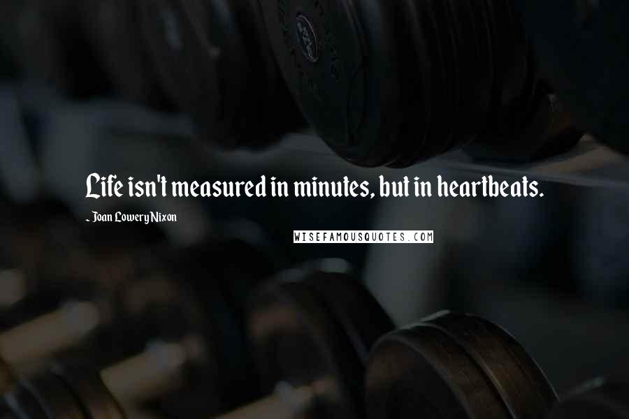 Joan Lowery Nixon Quotes: Life isn't measured in minutes, but in heartbeats.