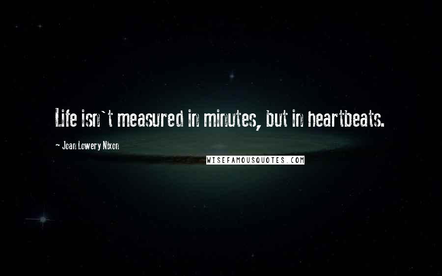 Joan Lowery Nixon Quotes: Life isn't measured in minutes, but in heartbeats.