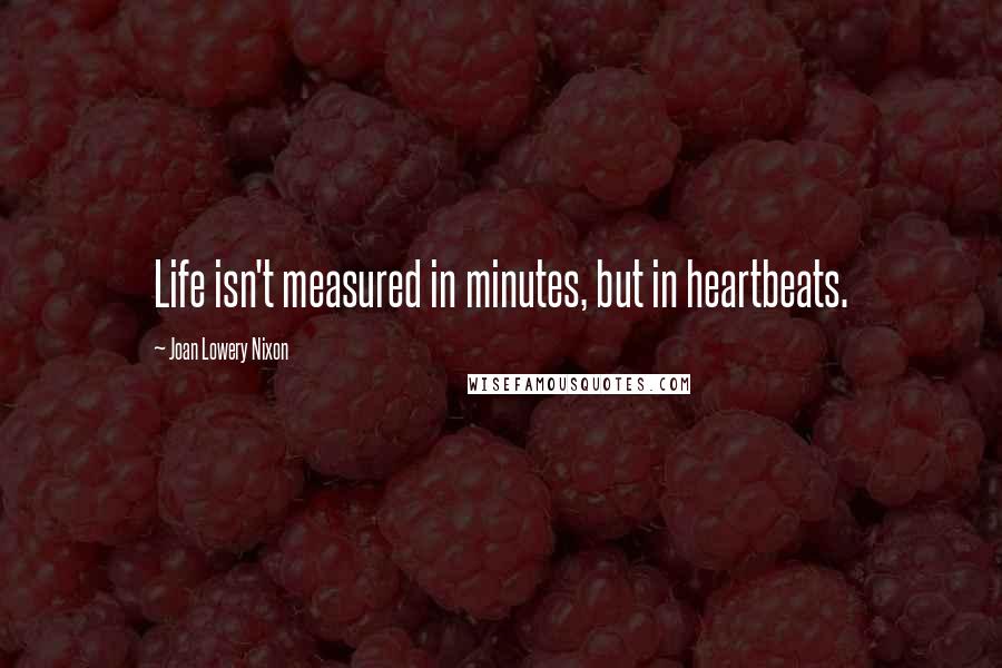 Joan Lowery Nixon Quotes: Life isn't measured in minutes, but in heartbeats.