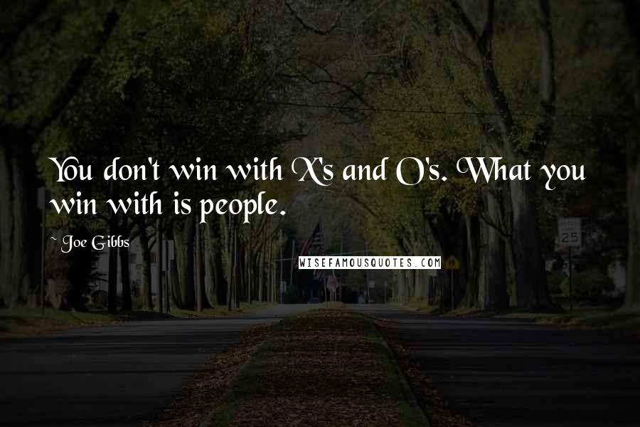 Joe Gibbs Quotes: You don't win with X's and O's. What you win with is people.