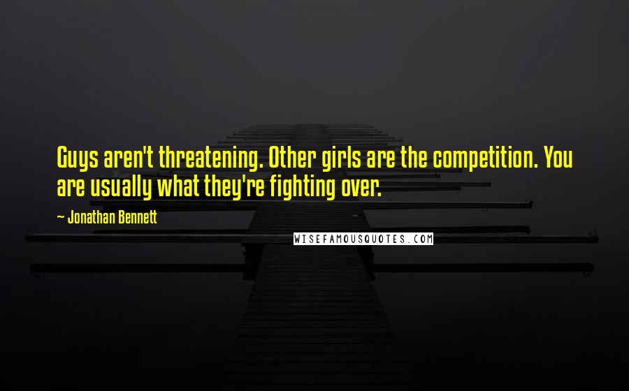 Jonathan Bennett Quotes: Guys aren't threatening. Other girls are the competition. You are usually what they're fighting over.