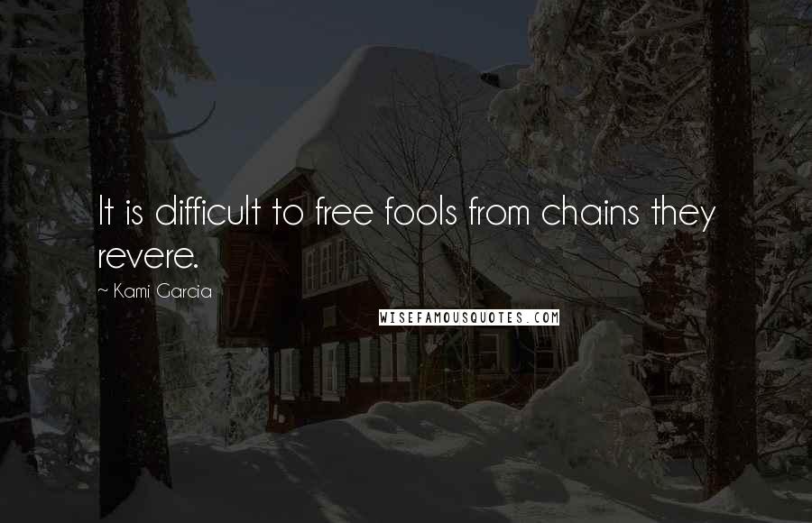 Kami Garcia Quotes: It is difficult to free fools from chains they revere.