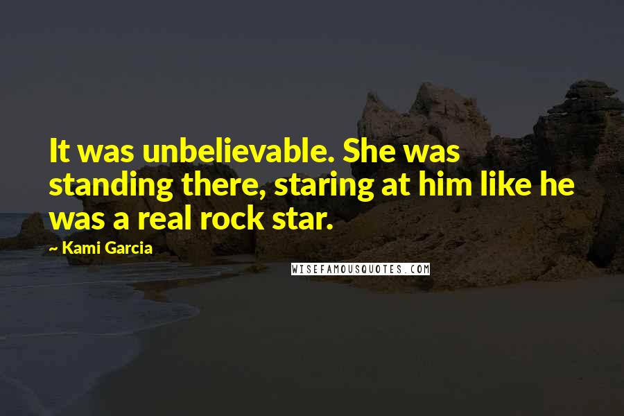 Kami Garcia Quotes: It was unbelievable. She was standing there, staring at him like he was a real rock star.