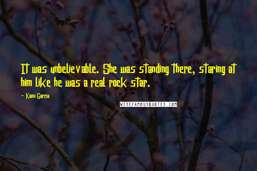 Kami Garcia Quotes: It was unbelievable. She was standing there, staring at him like he was a real rock star.