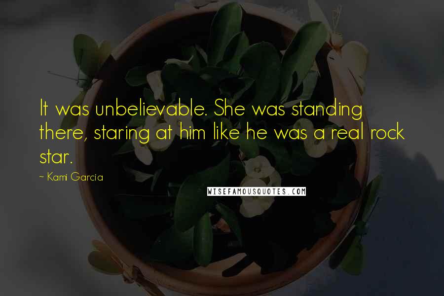 Kami Garcia Quotes: It was unbelievable. She was standing there, staring at him like he was a real rock star.