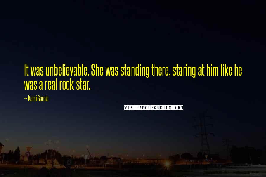 Kami Garcia Quotes: It was unbelievable. She was standing there, staring at him like he was a real rock star.